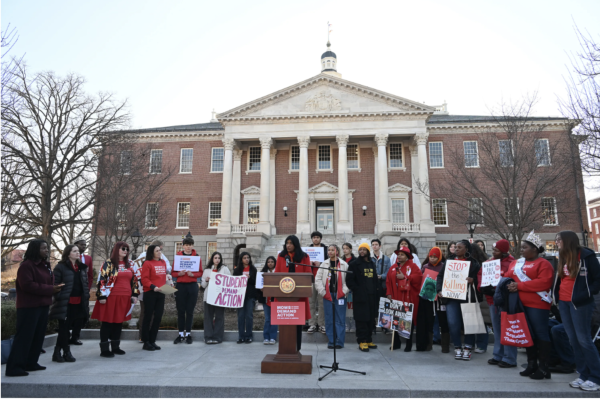 The UHS Students Demand Action Club stands behind speaker Lieutenant Governor Aruna Miller as she delivers a powerful speech addressing her support in aiding the urgent crisis of gun violence.
Starting from the left: Connor Doyle-Wandell, Malak Kamel, Shivani Menon, Warsha Abersiriwardana, Yousef Kamel, Charlotte Thibodeau, Maverick Breuker, Rakshita Jayas
